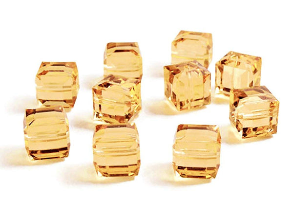 Wholesale Genuine Swarovski 5601 6mm Light Peach Cube Beads, Choose Package Size - BeadPrism