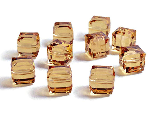 Wholesale Genuine Swarovski 5601 6mm Light Colorado Topaz Cube Beads, Choose Package Size - BeadPrism