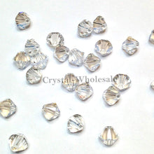 Load image into Gallery viewer, Swarovski Crystal, #5328 Bicone Beads 5mm, Crystal Moonlight, Wholesale Packs - BeadPrism