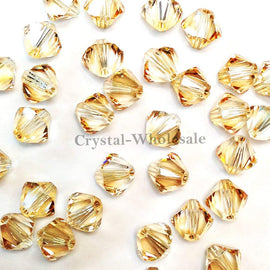 Swarovski Crystal, #5328 Bicone Beads 5mm, Crystal Golden Shadow, Wholesale Packs - BeadPrism
