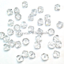 Swarovski Crystal, #5328 Bicone Beads 3mm, Crystal, Wholesale Packs - BeadPrism