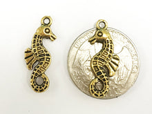 Load image into Gallery viewer, 25 Pc Seahorse Charms 26mm, Gold Plated Pewter Charms, sealife charms, Double sided charms - PP104GP - BeadPrism