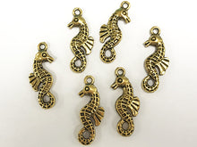 Load image into Gallery viewer, 25 Pc Seahorse Charms 26mm, Gold Plated Pewter Charms, sealife charms, Double sided charms - PP104GP - BeadPrism