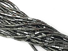 Load image into Gallery viewer, Hematite Gunmetal Beads Hexagon tubes 5mm x 3mm 16" strand 85 beads - SHM5-GM Gunmetal Hematite Bead - BeadPrism