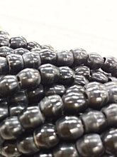 Load image into Gallery viewer, 100Pc Carved Horn Oval Beads, Black Horn Spacer Bead Strands, Tribal Ethnic Beads, BULK-BOSB - BeadPrism
