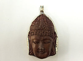 Nepalese carved Wood Buddha Pendant set in white Metal Bezel,  2.3